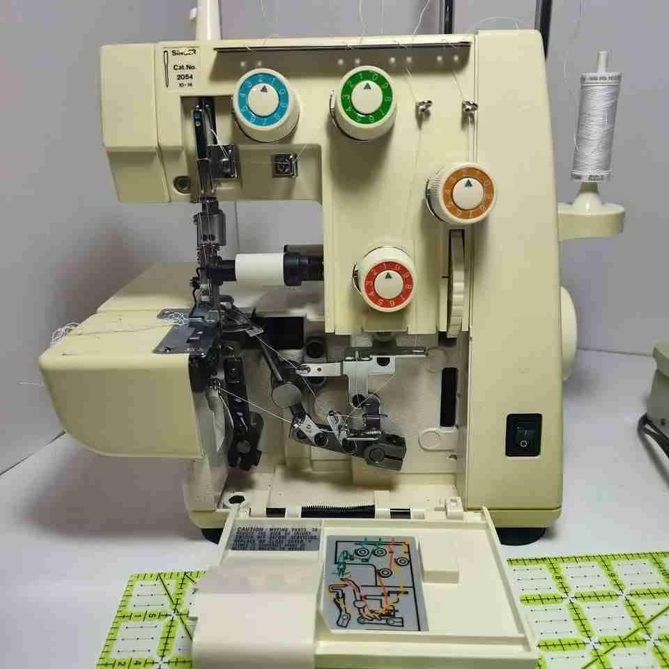 Professional serger tension dial tuning and calibration in Houston repair shop